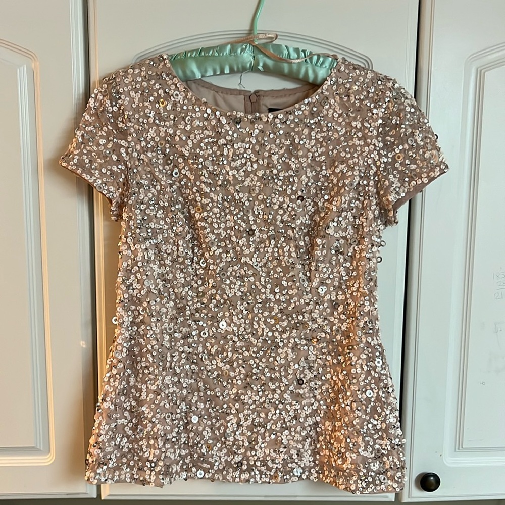 Adriane Papel sequin top.
Size: eight
Color: blush